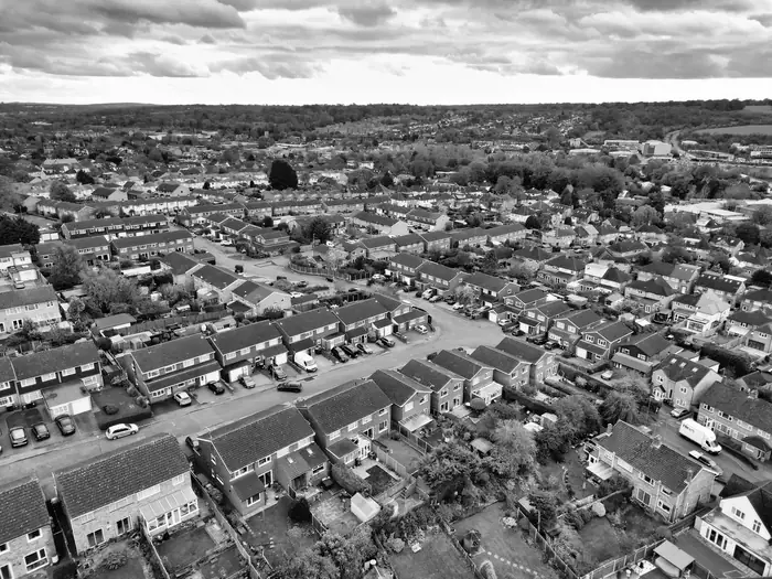 Aerial view of suburban semi-detached houses with hipped roofs and long ridge lines, typical of the interwar streets of south Croydon