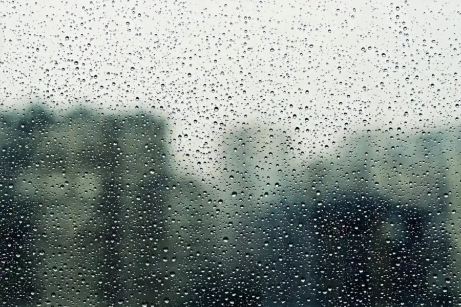 Rain running down a window during a storm over Croydon